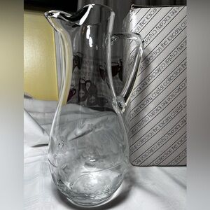 Toscany glass pitcher with an engraved floral design, from the "Heritage"